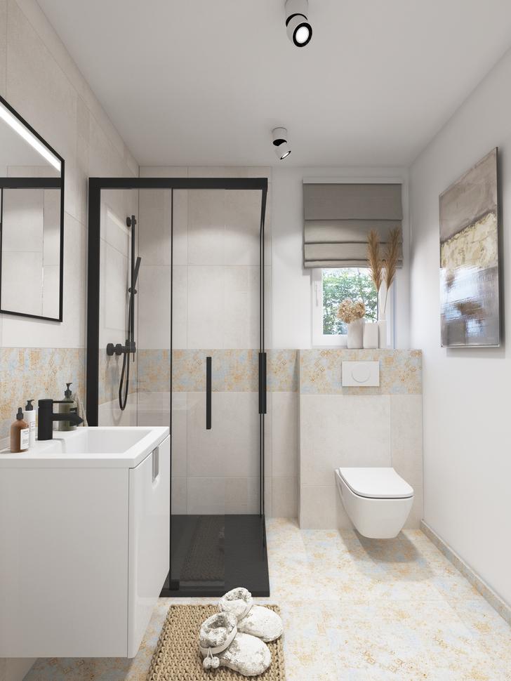 helles Badezimmer mit grauen Fliesen und pastellfarbenen Akzenten