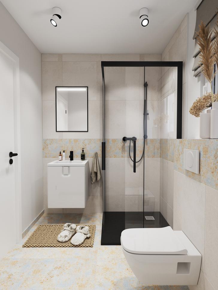 helles Badezimmer mit grauen Fliesen und pastellfarbenen Akzenten